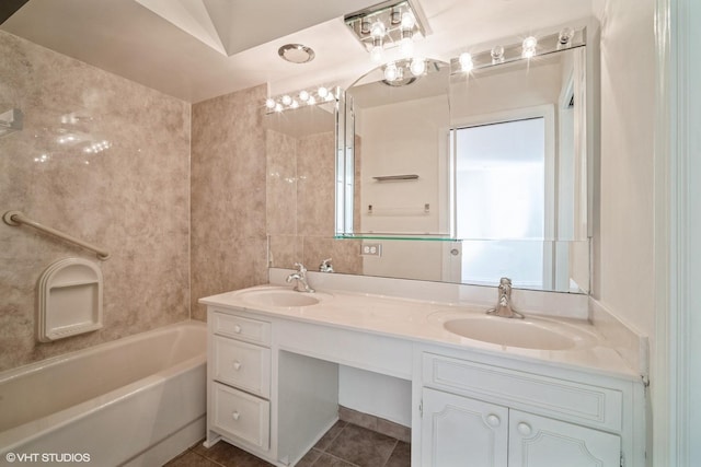 bathroom featuring vanity, tile patterned floors, and tile walls