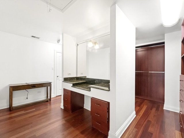 bathroom featuring wood-type flooring