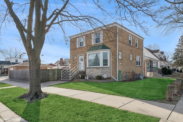 view of front of home featuring a front lawn