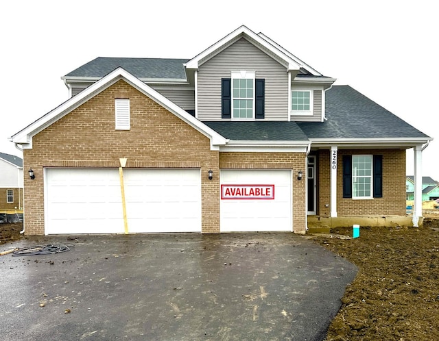 view of front of property featuring a garage