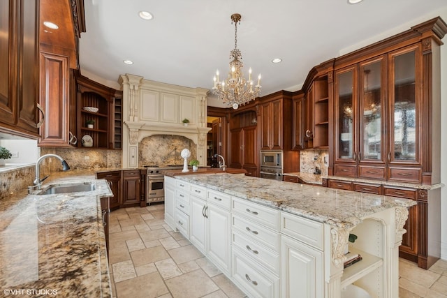 kitchen featuring open shelves, light stone counters, stone tile flooring, stainless steel appliances, and a sink