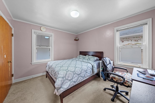 carpeted bedroom featuring crown molding