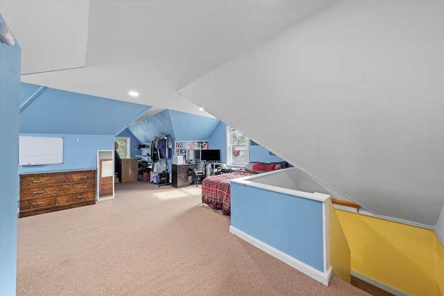 carpeted bedroom featuring vaulted ceiling