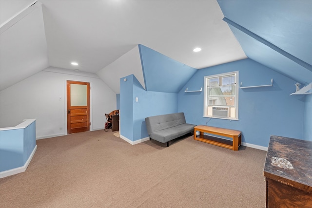 additional living space with carpet and lofted ceiling