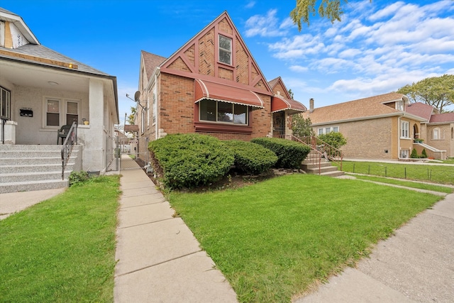 view of front of home with a front lawn