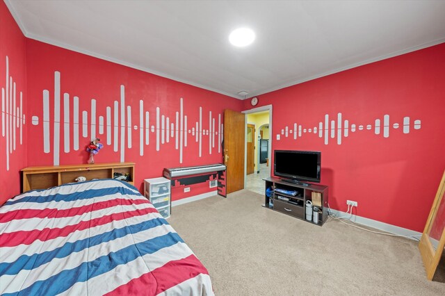 carpeted bedroom featuring ornamental molding