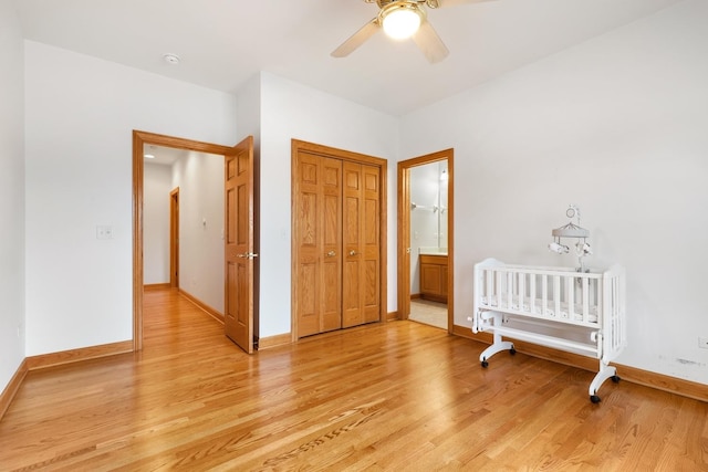 bedroom featuring a closet, ceiling fan, and light hardwood / wood-style flooring