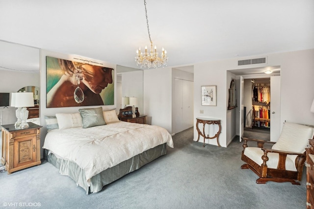 carpeted bedroom featuring a closet and a notable chandelier