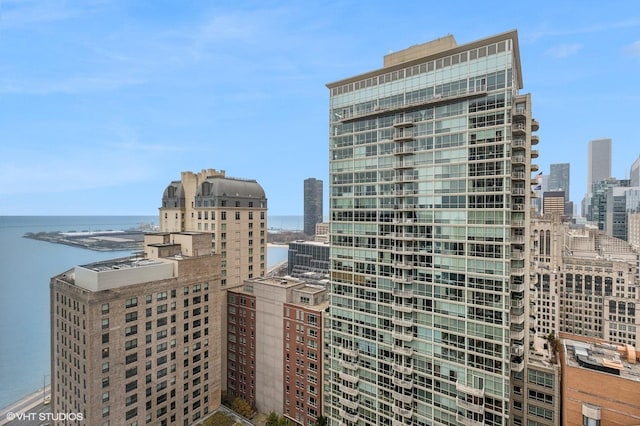 property's view of city with a water view