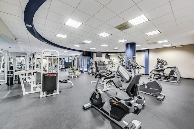 workout area featuring a drop ceiling