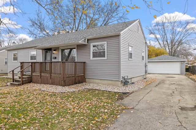 view of front of home featuring an outbuilding and a garage