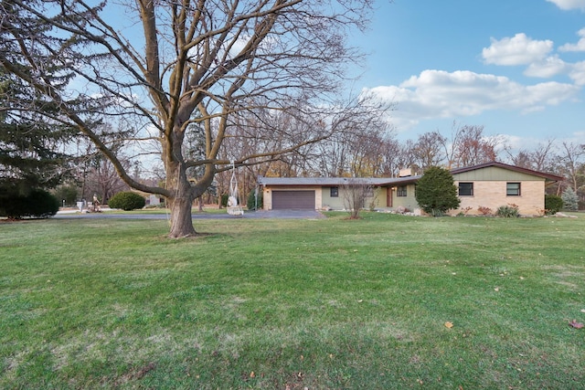 view of yard with a garage