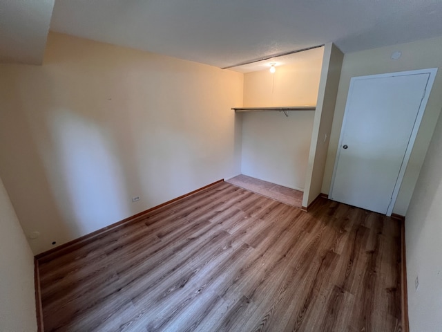 interior space with hardwood / wood-style flooring