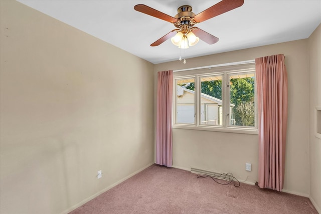 empty room featuring light carpet and ceiling fan