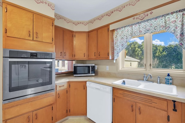 kitchen featuring stainless steel appliances and sink