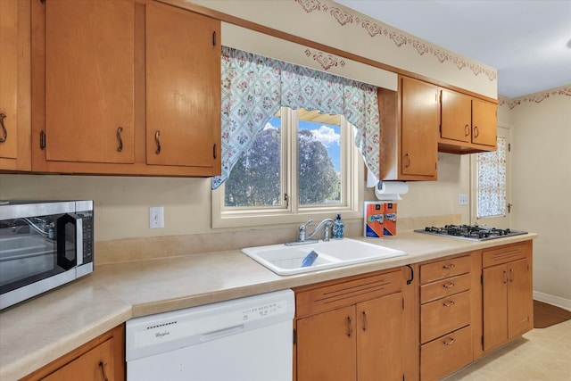 kitchen featuring sink and appliances with stainless steel finishes