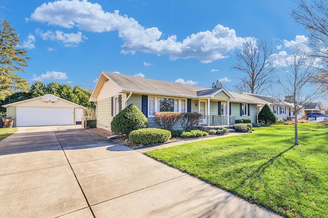 single story home featuring an outbuilding, a front lawn, covered porch, and a garage