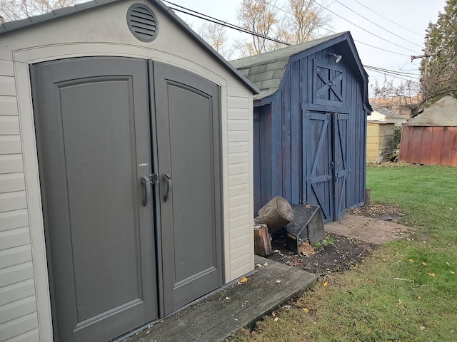 view of outdoor structure featuring a yard