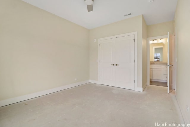 unfurnished bedroom featuring a closet and ceiling fan