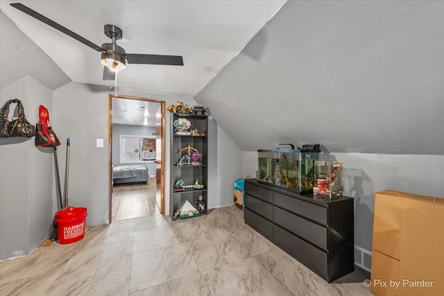 additional living space with light hardwood / wood-style flooring, ceiling fan, and lofted ceiling