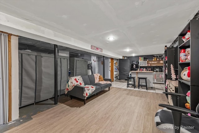 basement with light wood-type flooring