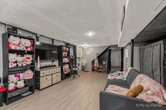 living room with light hardwood / wood-style flooring