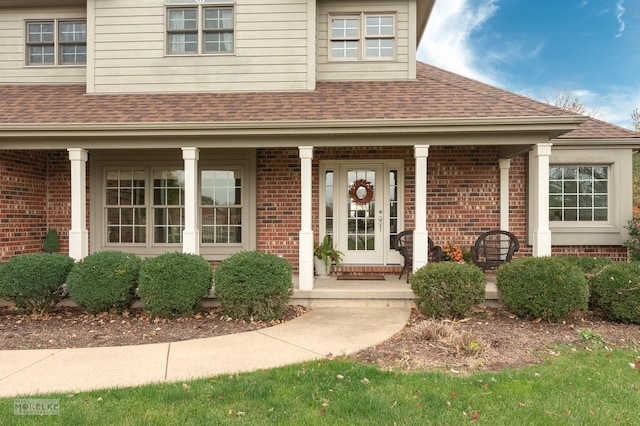 doorway to property featuring a porch