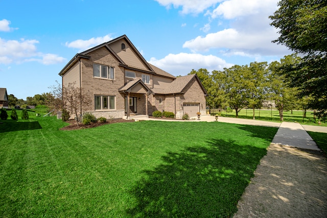 craftsman house featuring a front lawn and a garage