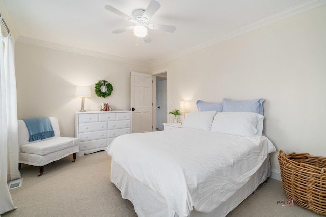 bedroom with ceiling fan, ornamental molding, and light carpet