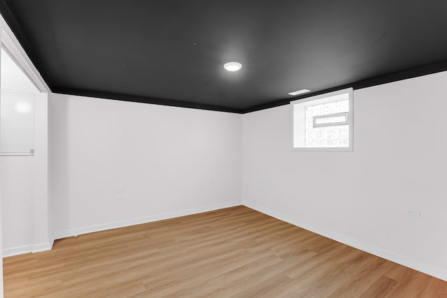 basement with light wood-type flooring