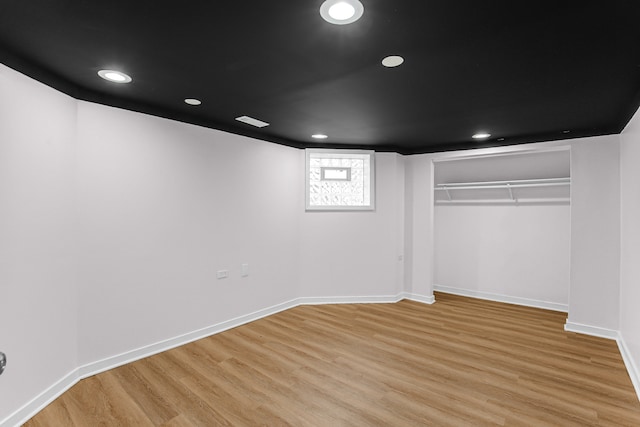 unfurnished bedroom featuring light wood-type flooring