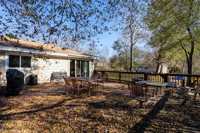 exterior space featuring a wooden deck