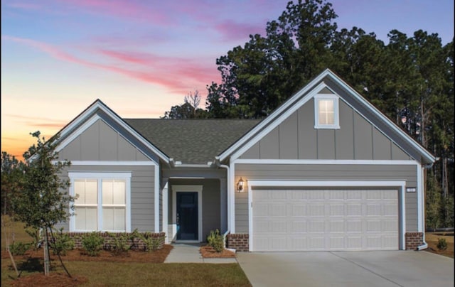 view of front of property with a garage