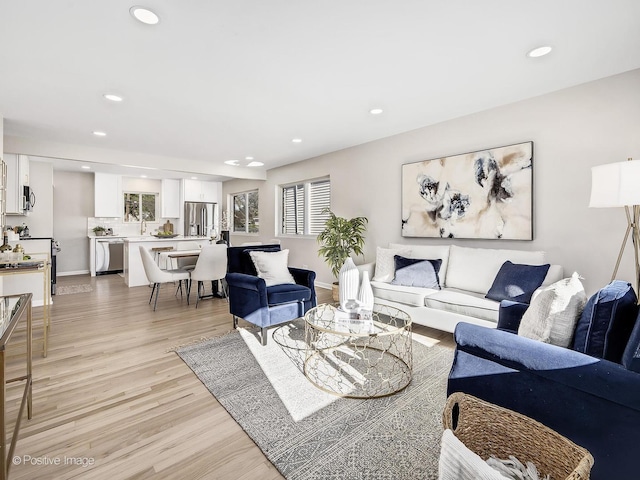 living room with light hardwood / wood-style floors