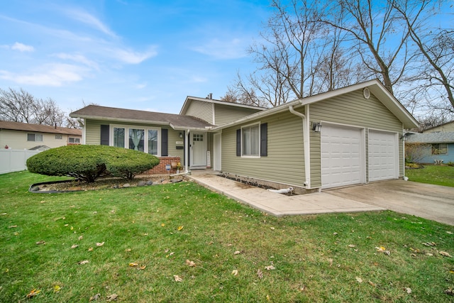 view of front of house featuring a front yard and a garage