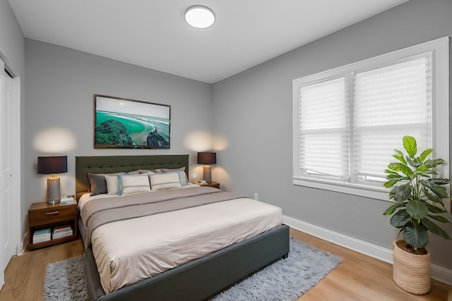 bedroom featuring light hardwood / wood-style flooring