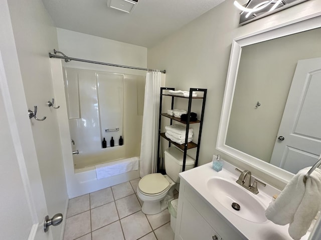 full bathroom with tile patterned floors, shower / bath combo with shower curtain, vanity, and toilet