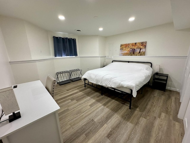 bedroom featuring hardwood / wood-style flooring