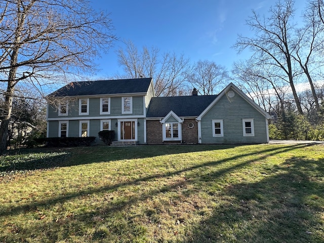 view of front of house with a front lawn