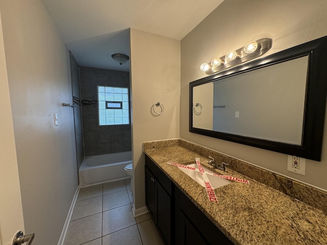 full bathroom with tile patterned flooring, vanity, toilet, and tiled shower / bath combo