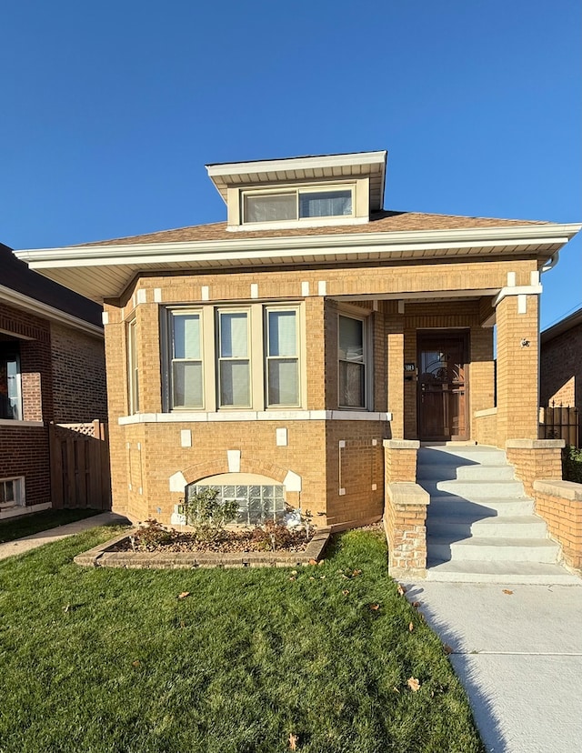 view of front facade with a front yard