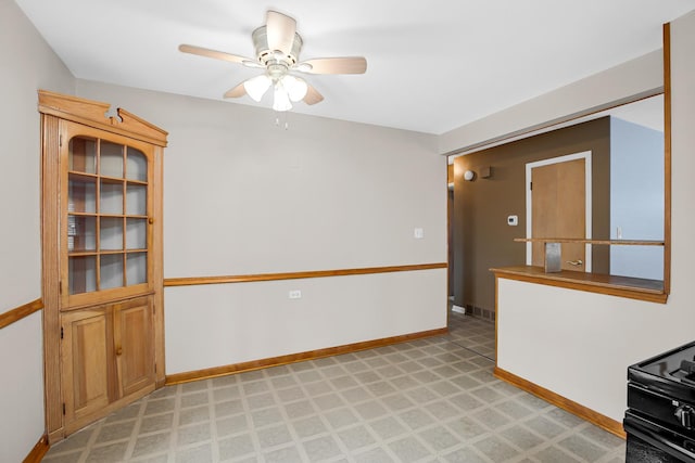 empty room featuring ceiling fan