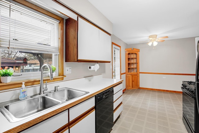 kitchen with ceiling fan, white cabinets, sink, and black appliances