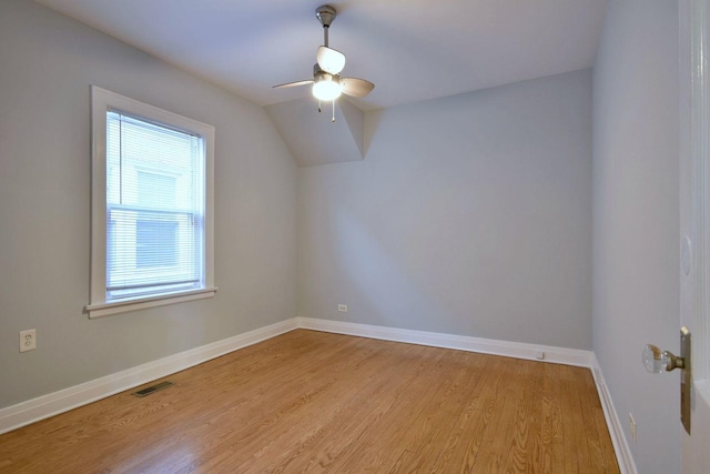 bonus room featuring light hardwood / wood-style floors, ceiling fan, and lofted ceiling