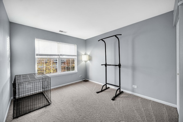 interior space with baseboards and visible vents