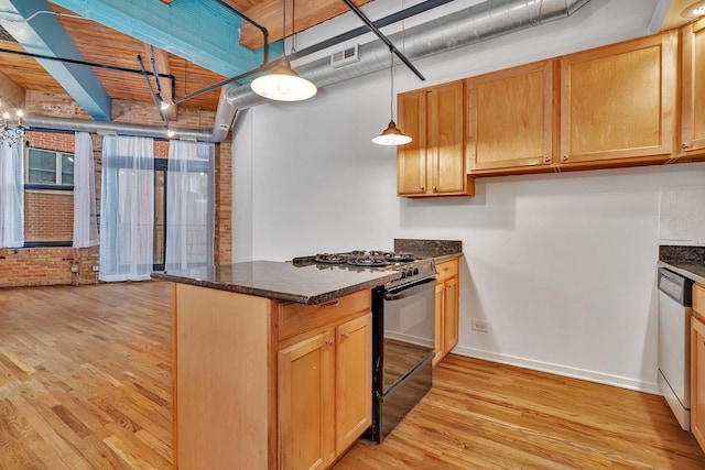 kitchen with stainless steel dishwasher, light hardwood / wood-style floors, decorative light fixtures, gas stove, and brick wall