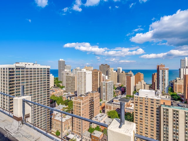 property's view of city featuring a water view