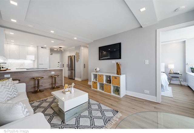 living room featuring light hardwood / wood-style floors