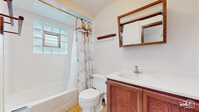 full bathroom featuring vanity, shower / bath combo, and toilet