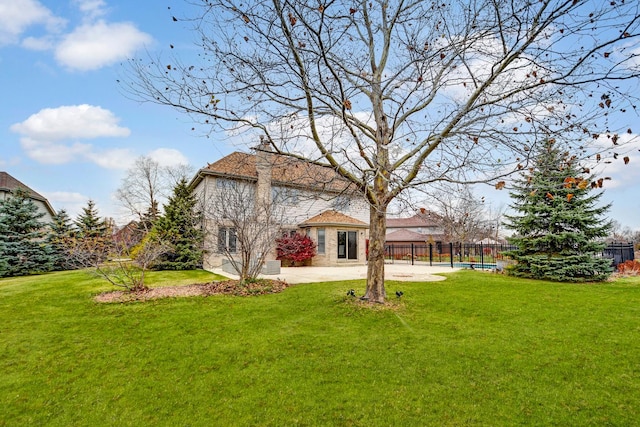 view of yard with a patio area and fence